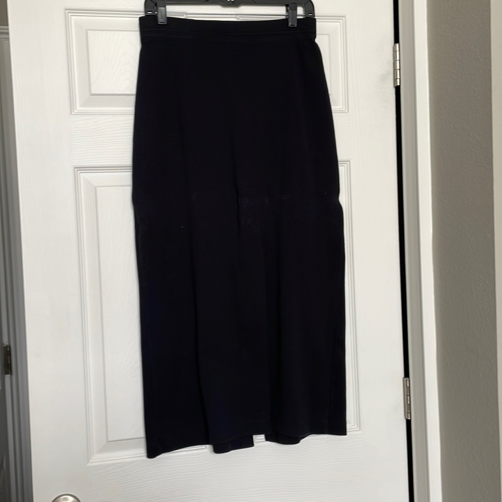 Med black ankle length skirt. Slit in the back Gentle use.